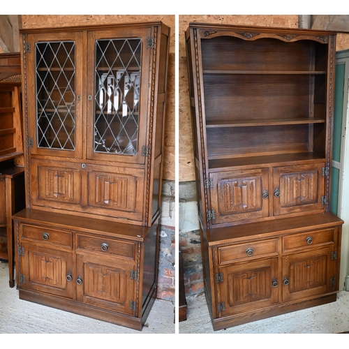 315 - Jaycee Furniture Ltd (Brighton) a companion pair of linenfold panelled oak wall units, one with latt... 