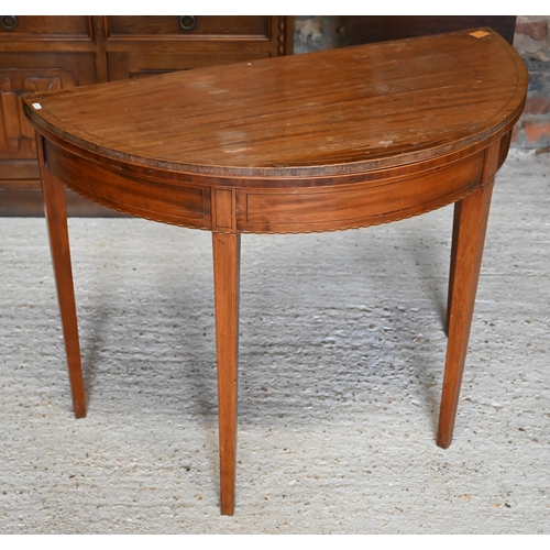 318 - #A 19th century mahogany folding demi-lune card table with baize lining, 92 x 45 x 70 cm h a/f