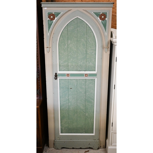 319 - #A painted and Tudor Rose carved wardrobe with Gothic arch panelled door, shelved interior, 80 x 40 ... 