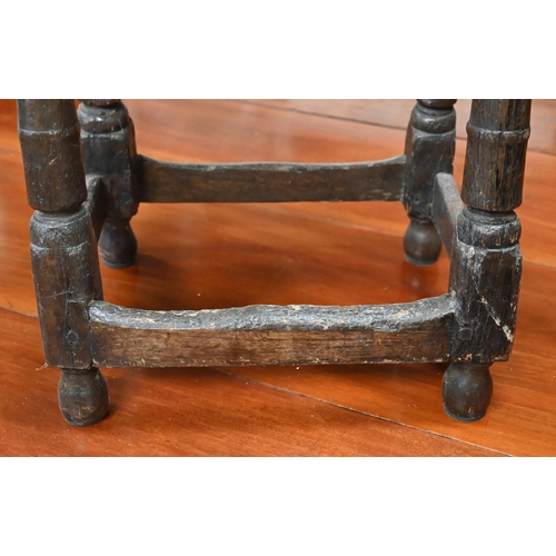 325 - An antique oak joint stool with lunette carved frieze, turned legs united by stretchers, 44 x 28 x 5... 