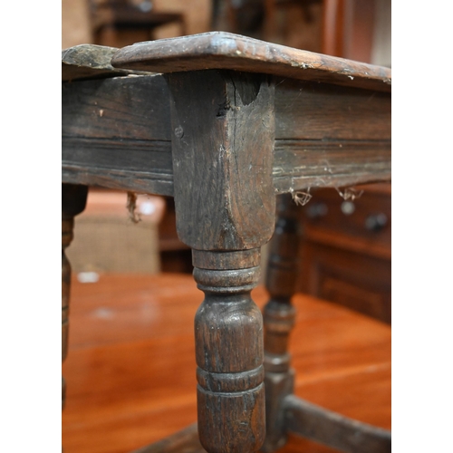 325 - An antique oak joint stool with lunette carved frieze, turned legs united by stretchers, 44 x 28 x 5... 