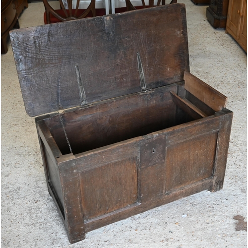 330 - A small 17th century panelled oak coffer, with hinged top and jointed construction, 86 x 40 x 48 cm ... 