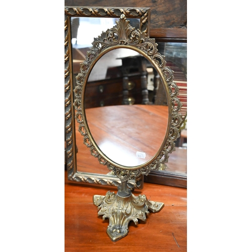 335 - An oval wall mirror in decorative gilt frame, gilt framed triptych mirror, pierced brass dressing ta... 