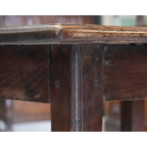 340 - An 18th century Provincial oak rectangular side table on square supports united by stretchers, 80 x ... 