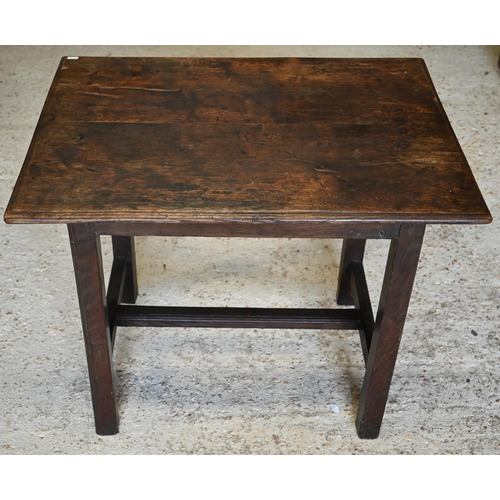 340 - An 18th century Provincial oak rectangular side table on square supports united by stretchers, 80 x ... 