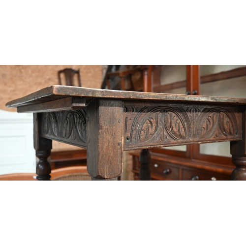 341 - A 17th century oak rectangular side table with lunette carved frieze, turned supports united by stre... 