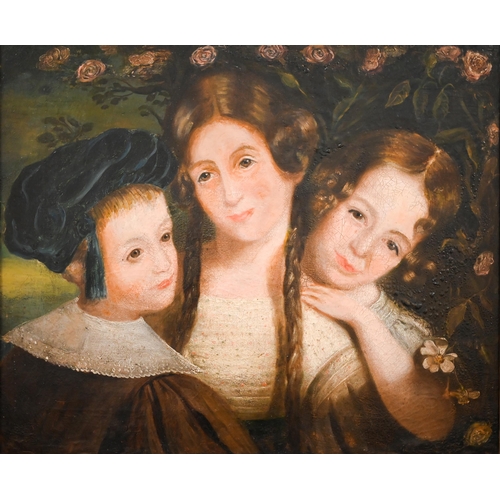 394 - An early 19th century family group, oil on canvas, 50 x 60 cm to/w an oval pastel study of a young w... 