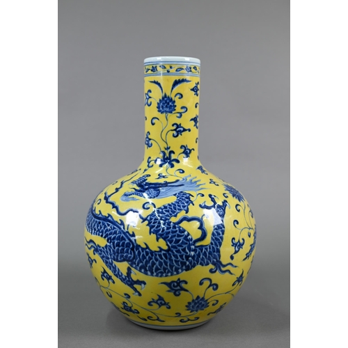 402 - A Chinese doucai vase with Qianlong mark, 31 cm high to/w a blue and yellow 'dragon' vase with Xuand... 