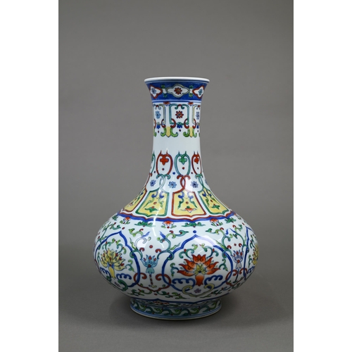 402 - A Chinese doucai vase with Qianlong mark, 31 cm high to/w a blue and yellow 'dragon' vase with Xuand... 