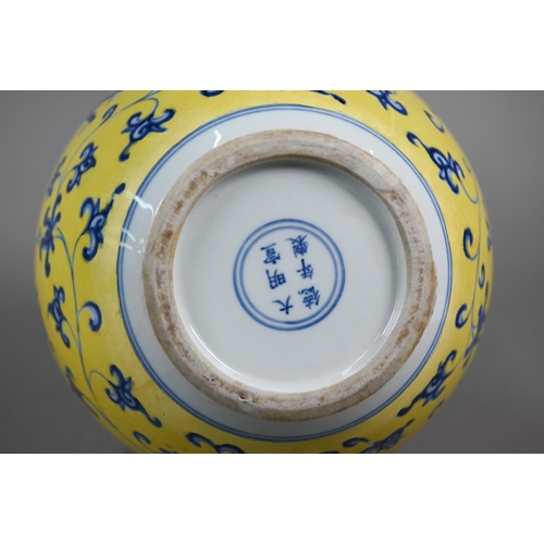 402 - A Chinese doucai vase with Qianlong mark, 31 cm high to/w a blue and yellow 'dragon' vase with Xuand... 