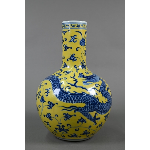 402 - A Chinese doucai vase with Qianlong mark, 31 cm high to/w a blue and yellow 'dragon' vase with Xuand... 