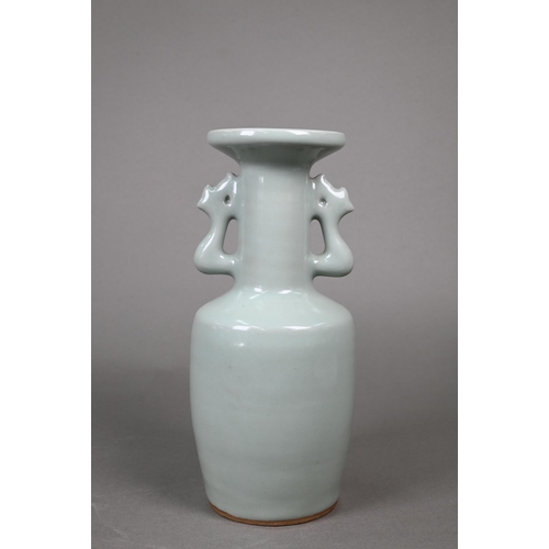 403 - A mixed group of Chinese ceramics including a Song style celadon mallet-form vase, 25 cm high, a bro... 