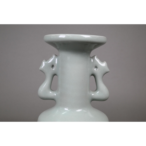 403 - A mixed group of Chinese ceramics including a Song style celadon mallet-form vase, 25 cm high, a bro... 