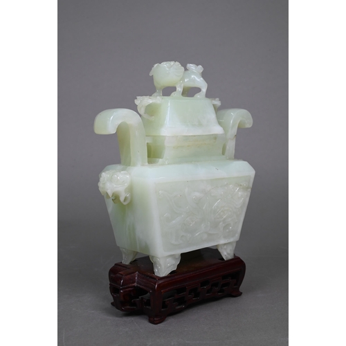 407 - A modern 'new jade' bowenite archaistic fang-ding form vessel and cover on hardwood stand to/w a sma... 