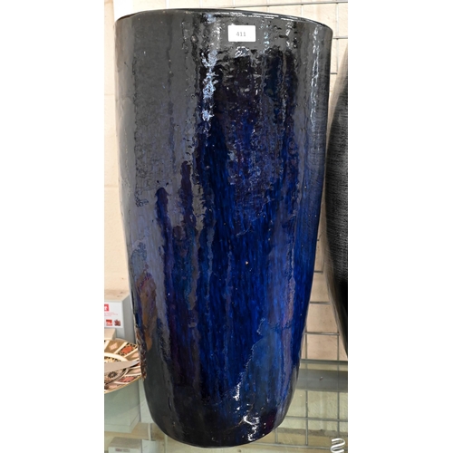 411 - A large blue-glazed ceramic vase/stickstand to/w a large pottery baluster vase (2)