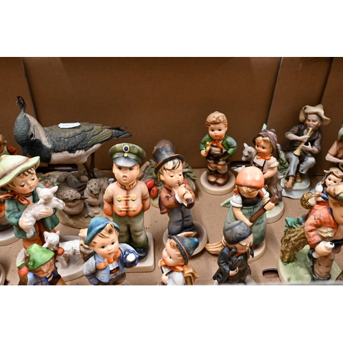 434 - Twenty-one Goebels Hummel figures of children and other ornaments (box)