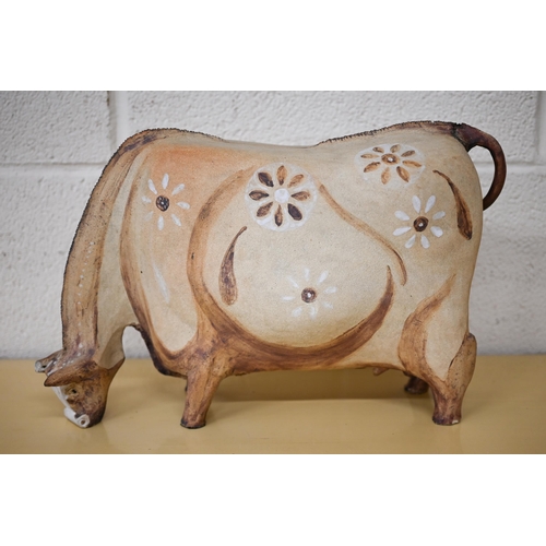 455 - André Lovet (Sidmouth, Devon) - a stoneware bull, signed, no 108, 36 cm long to/w an unmarked studio... 