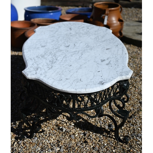 47 - An ornate marble top coffee table with green painted cast/wrought iron base, 127 cm x 72 cm x 47 cm ... 