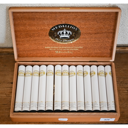 479 - A box of twenty-six Medallion Petit Coronas cigars, in tubes, to/w a leather three-cigar slip-case