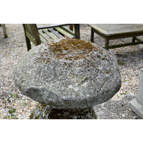 5 - A substantial antique cut stone staddle stone with cap, 82 cm h