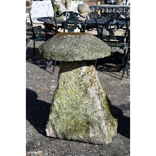 5 - A substantial antique cut stone staddle stone with cap, 82 cm h