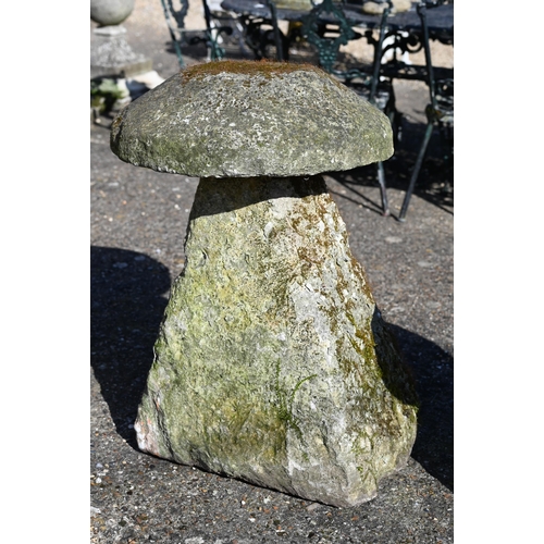 5 - A substantial antique cut stone staddle stone with cap, 82 cm h