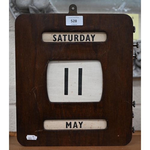 528 - A vintage wooden office-type perpetual calendar, 30 x 27 cm