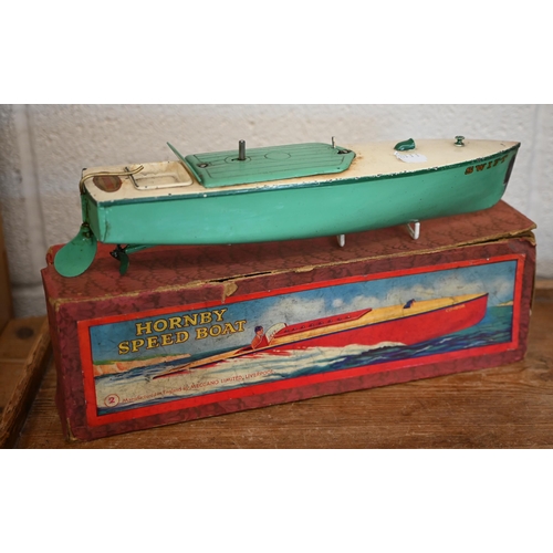 536 - A vintage boxed Hornby clockwork Speedboat 'Swift' to/w two Tri-ang Minic trucks (a/f), a boxed Corg... 