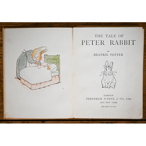 539 - A selection of vintage Beatrix Potter books (a/f), in oak bookcase