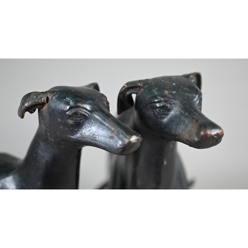 545 - A pair of painted cast iron lurchers, 30 x 36 cm approx