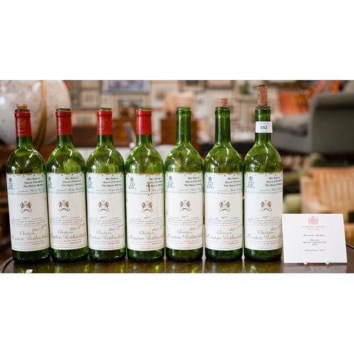 552 - Nine bespoke (empty) bottles of Chateau Mouton Rothschild, Pauillac 1977, supplied to HM Queen Eliza... 