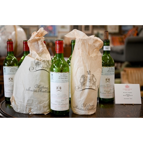 552 - Nine bespoke (empty) bottles of Chateau Mouton Rothschild, Pauillac 1977, supplied to HM Queen Eliza... 