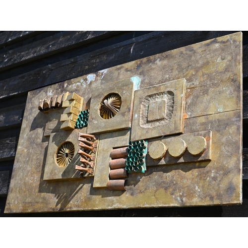 558 - #A 1970s abstract design relief panel, copper laid to wood, 50 x 92 cm