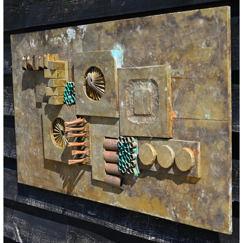 558 - #A 1970s abstract design relief panel, copper laid to wood, 50 x 92 cm