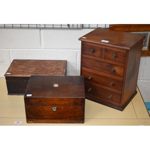 559 - A stained wood miniature chest of two short and three long drawers 38 x 30 cm to/w two other boxes (... 