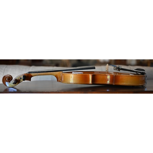 566 - #A Chinese Lark child's violin with 31 cm one piece back, in case with bow