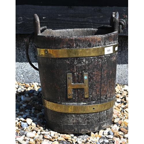 569 - A 19th century coopered oak well bucket with brass branding and letter 'H', 37 cm high