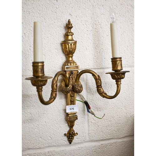 576 - Two cast brass Adam-style twin-branch wall lights, 38 cm high