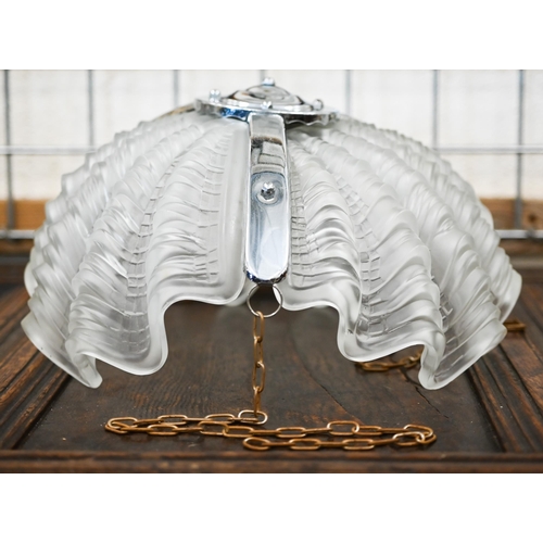 578 - An Art Deco chrome and glass ceiling lightshade with frosted shell segments, to/w two other shell se... 