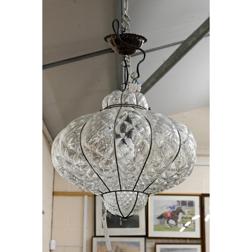 580 - A moulded glass ceiling light with wire-bound lobes, 41 cm diam