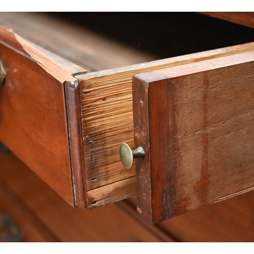 587 - A George III mahogany bureau with four long graduated drawers, raised on shaped bracket feet, 94 cm ... 