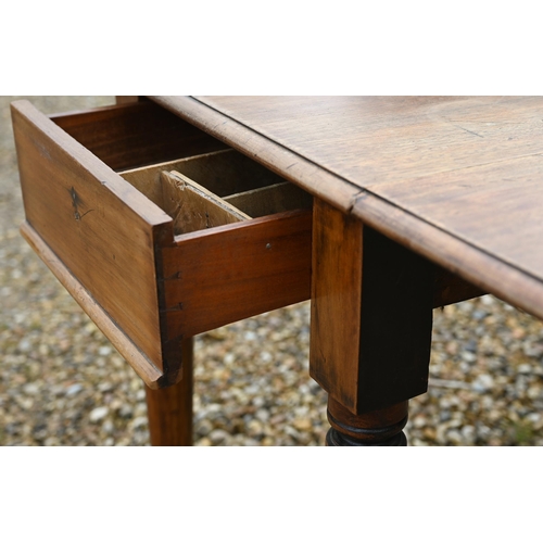 590 - A Victorian mahogany drop leaf Pembroke table, drawer to one end and raised on turned legs on castor... 