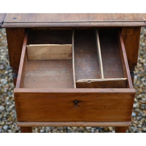 590 - A Victorian mahogany drop leaf Pembroke table, drawer to one end and raised on turned legs on castor... 