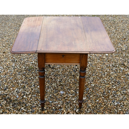 590 - A Victorian mahogany drop leaf Pembroke table, drawer to one end and raised on turned legs on castor... 