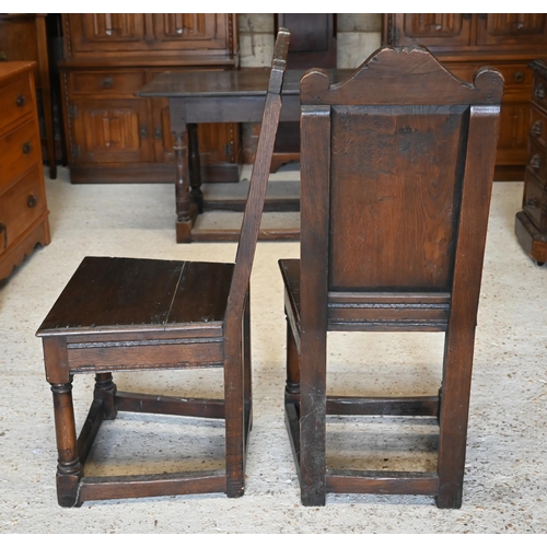 592 - A pair of late 17th/18th century North Country joint oak side chairs hall chairs t/with another pair... 