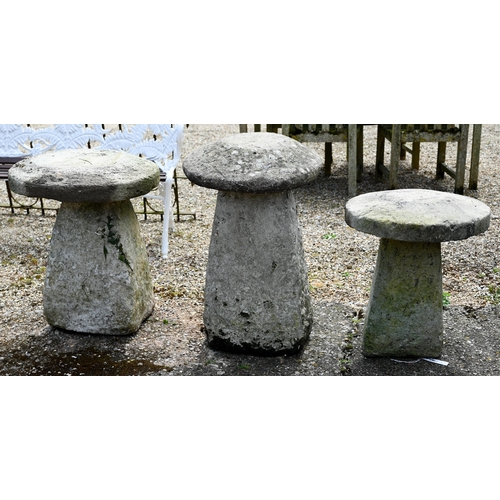 6 - A trio of antique staddle stones and caps (3)