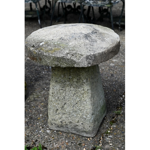 6 - A trio of antique staddle stones and caps (3)