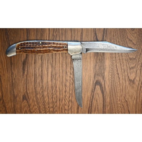 618 - A US Case pocket-knife with two folding 10 cm blades and antler grip