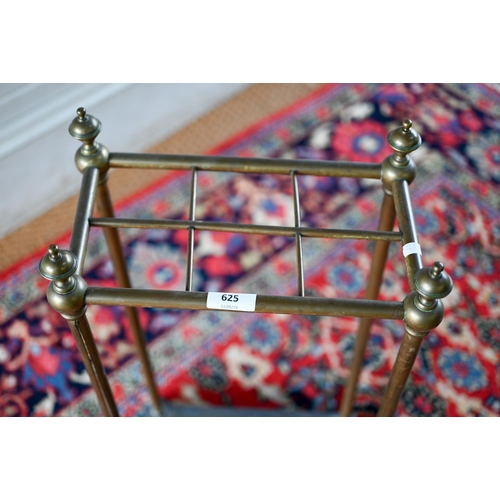 625 - An antique six division brass stick-stand with cast iron base, 32 cm x 18 cm x 64 cm h