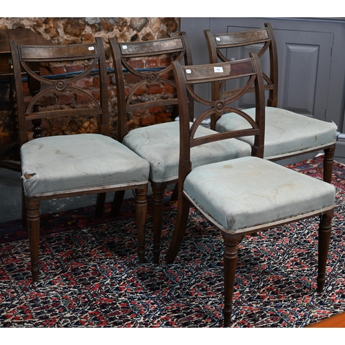 628 - #A set of four 'X' Regency mahogany dining side chairs, with overstuffed seats raised on turned fron... 